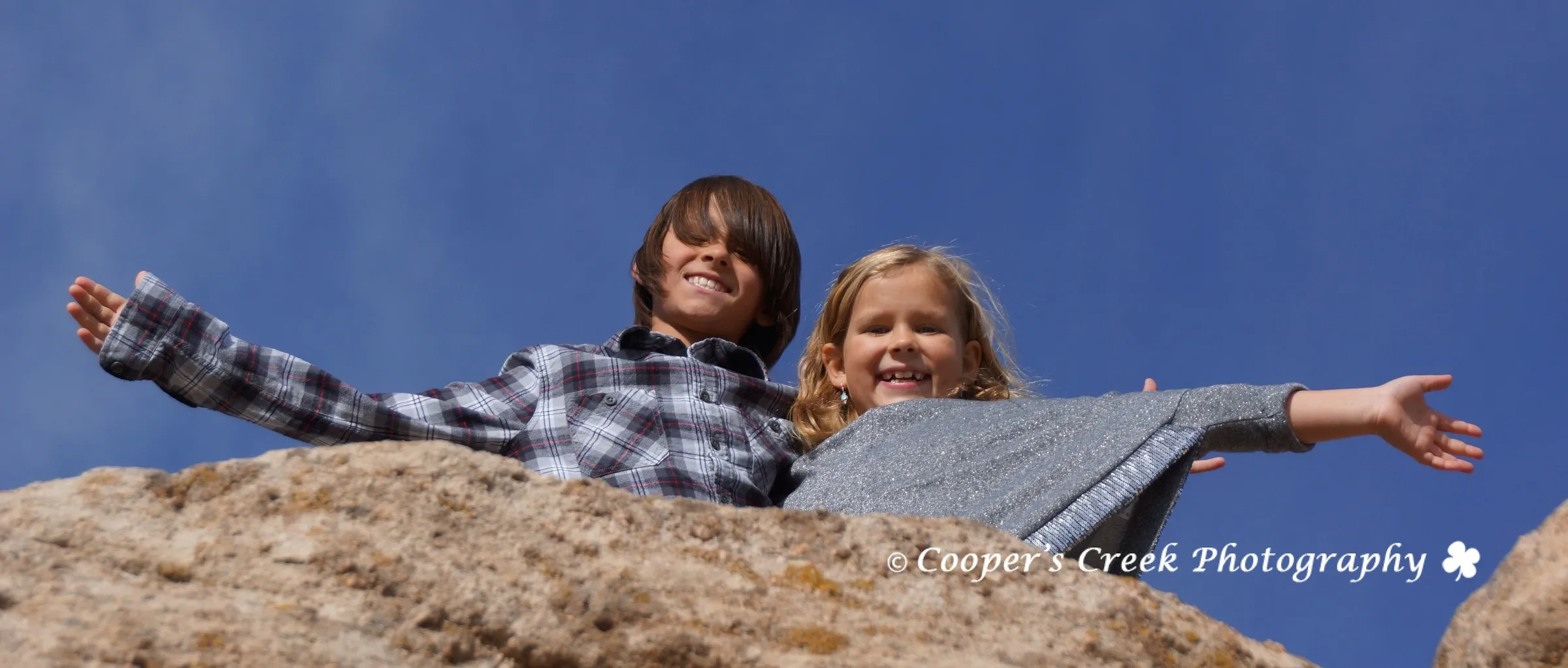 Brooks kids on rock